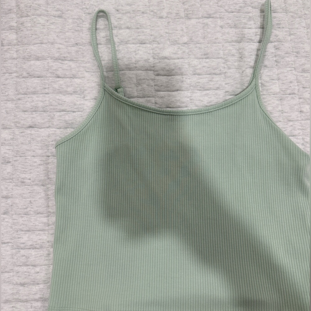 mint green american eagle tank top 
Size M